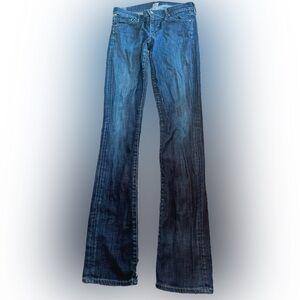 Blue Boot Cut Jeans with Subtle Fading